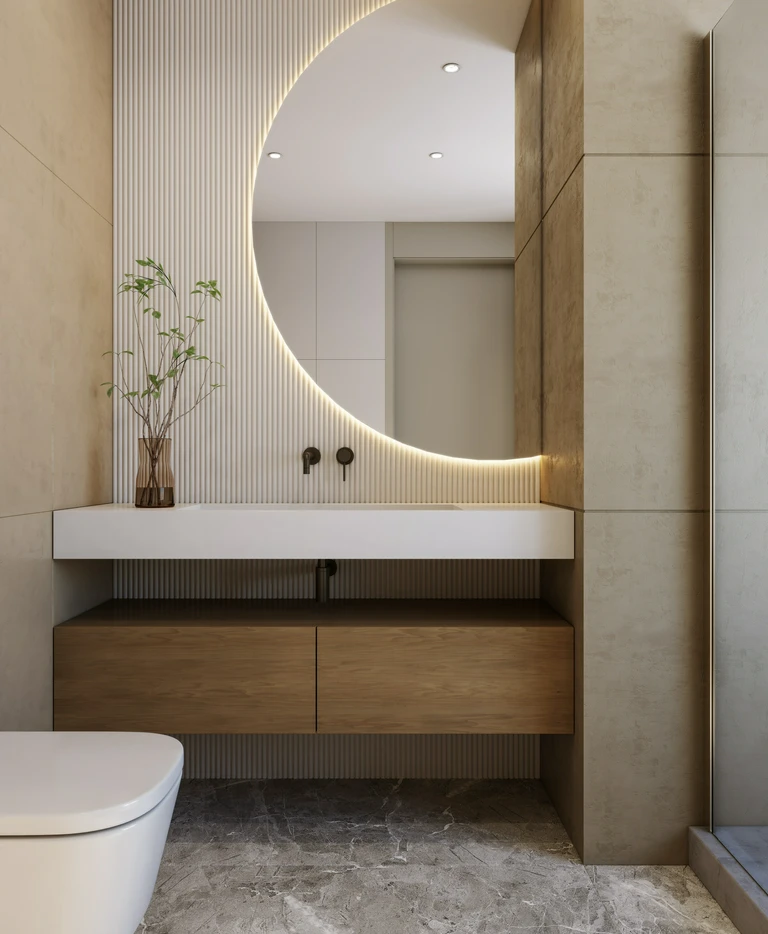 Półokrągłe lustro nad&nbsp;zlewem